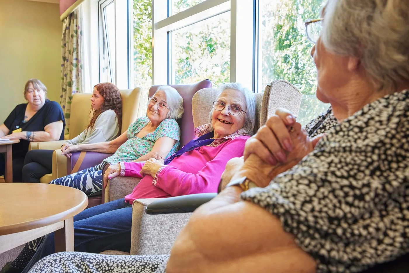 A resident enjoying an activity at a Future Care Group home