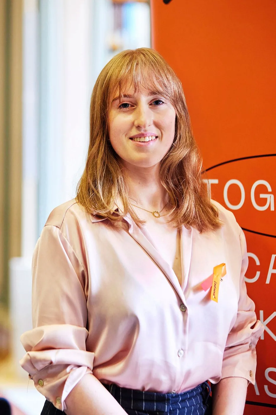 Portrait of Holly at the Leukaemia UK Annual Science Seminar
