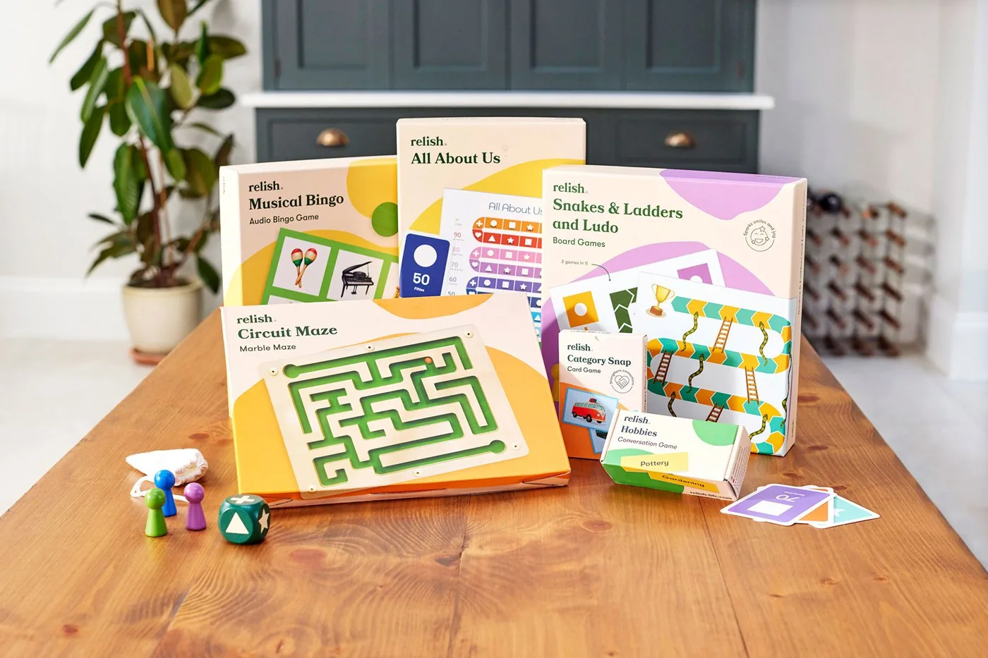 A display of Relish games and activity boxes on a table